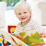 What should a two-year-old child be able to do according to the Munich Diagnostic System?