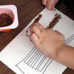 Playing with cereals to develop a child&#39;s fine motor skills